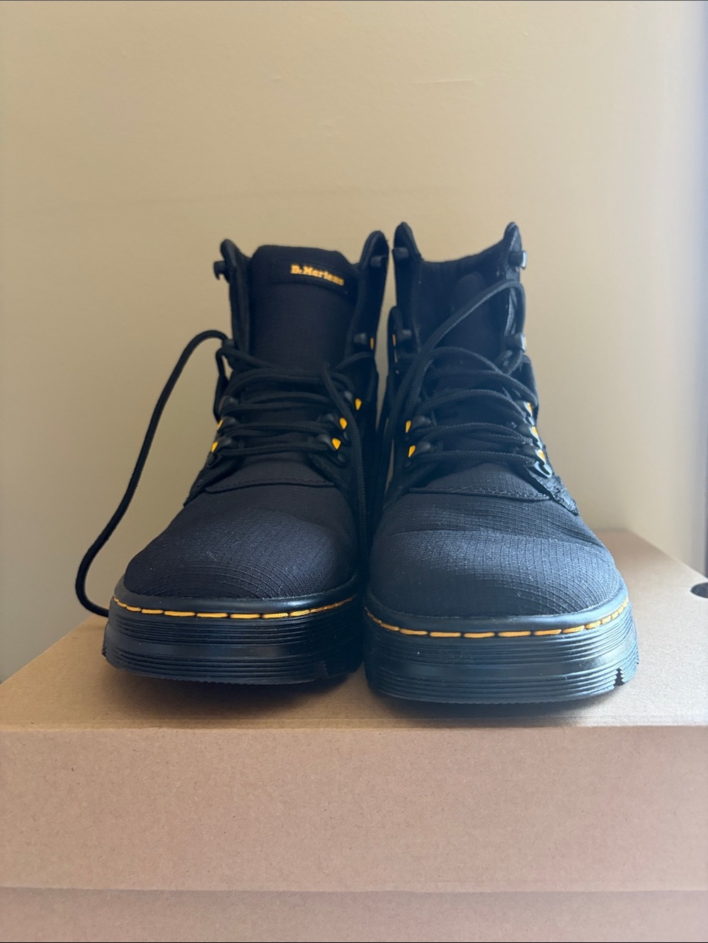 Dr. Martens Black Lace-Up Boots with Yellow Stitching